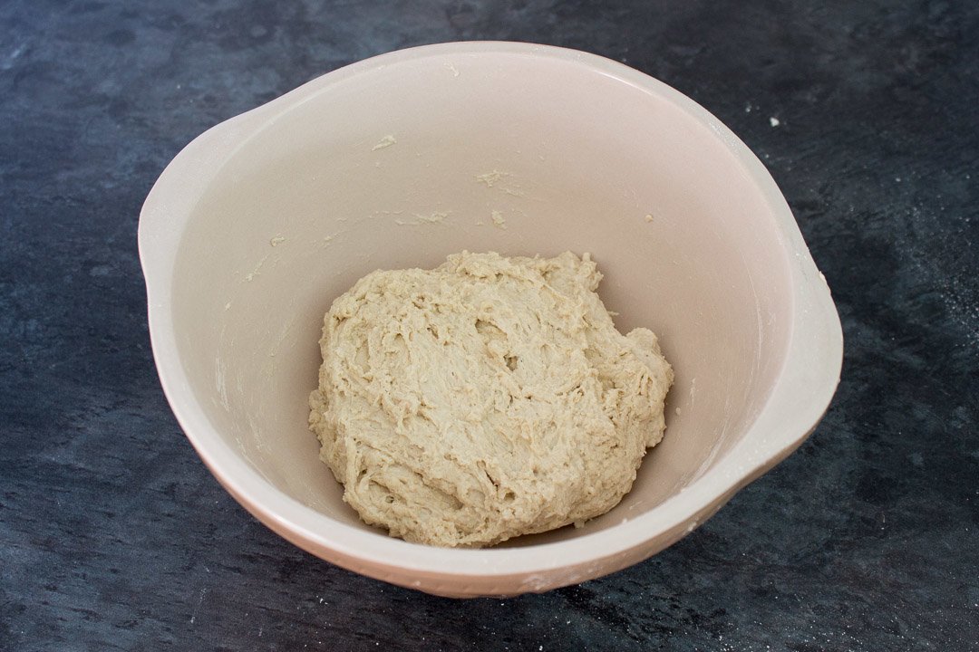 No knead bread dough in a large mixing bowl