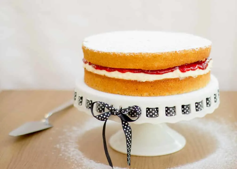 Victoria sandwich cake on a cake stand