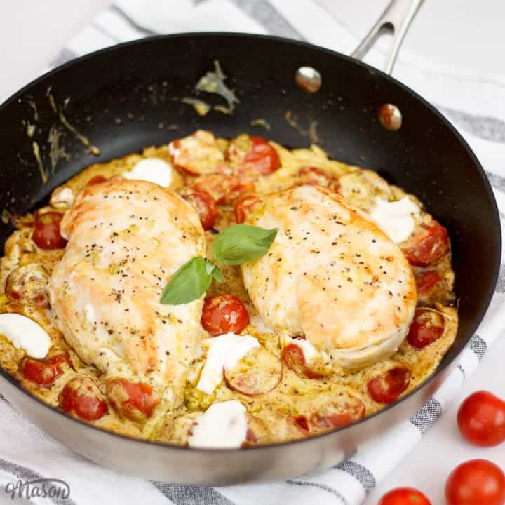Creamy pesto chicken in a frying pan
