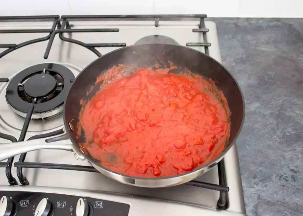 Tomato chilli pasta sauce cooking in a pan