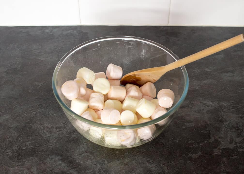 Caramel Krispie Bars: marshmallows in a glass bowl