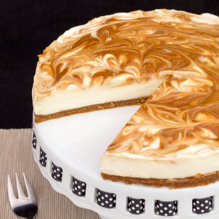 Biscoff Cheesecake on a cake stand