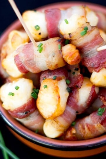 Bacon Halloumi Bites in a serving dish with cocktail sticks