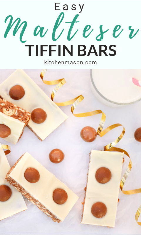 Malteser Tiffin Bars, a glass of milk and gold curling ribbon lay on a table.