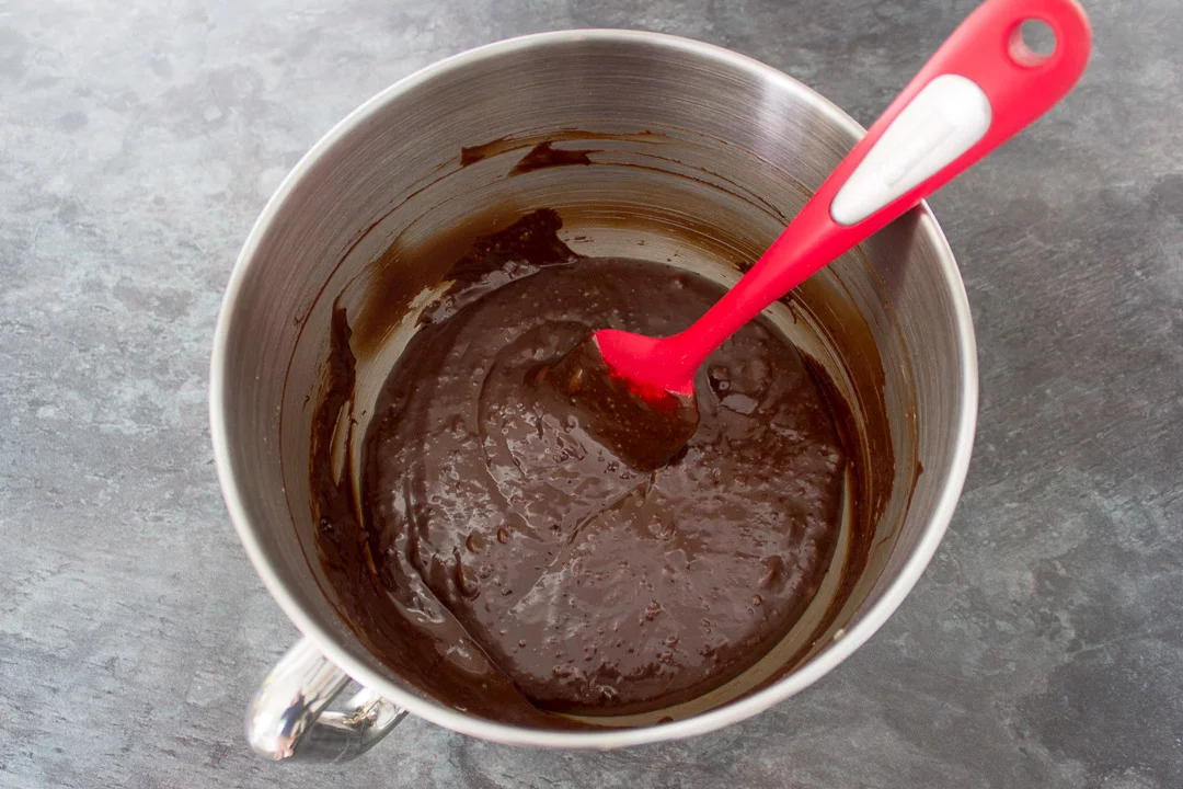 creme egg brownie batter in the bowl of an electric stand mixer