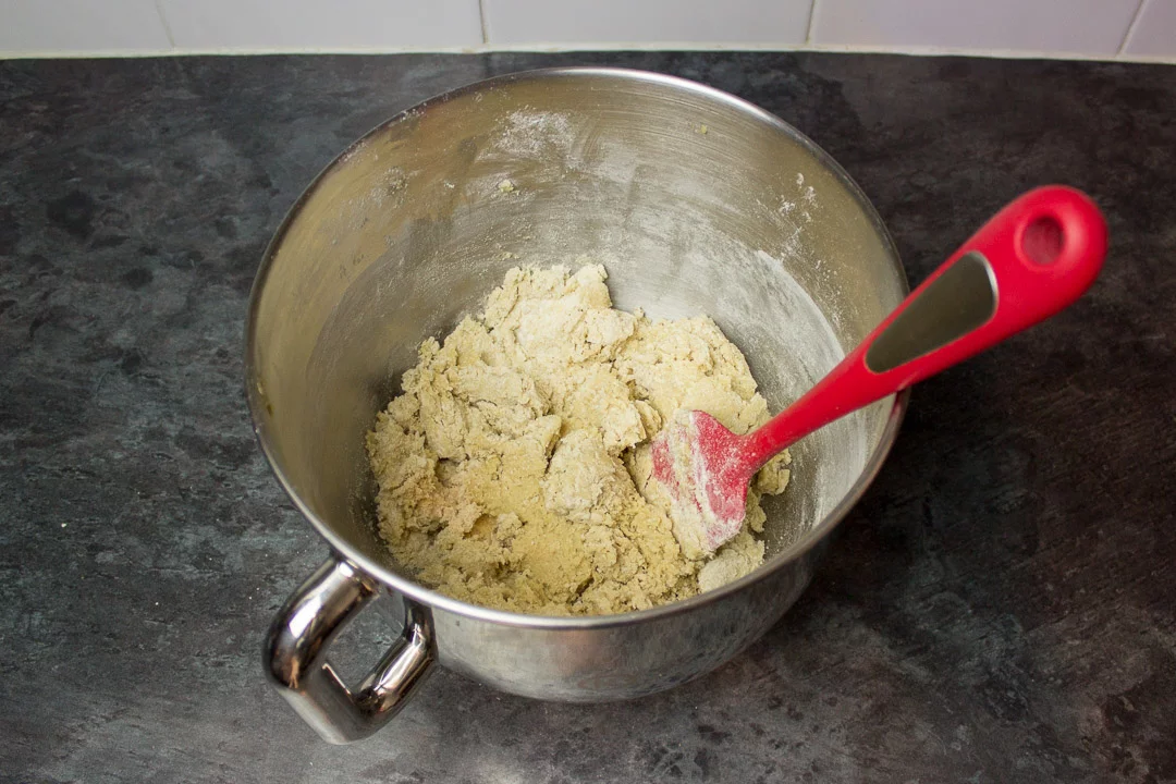 spider cookie dough in the bowl of an electric stand mixer