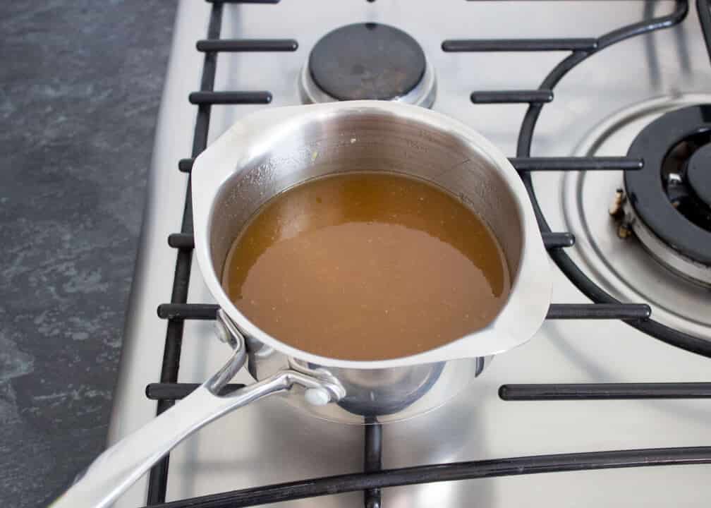 Flapjack syrup mixture in a saucepan on the hob