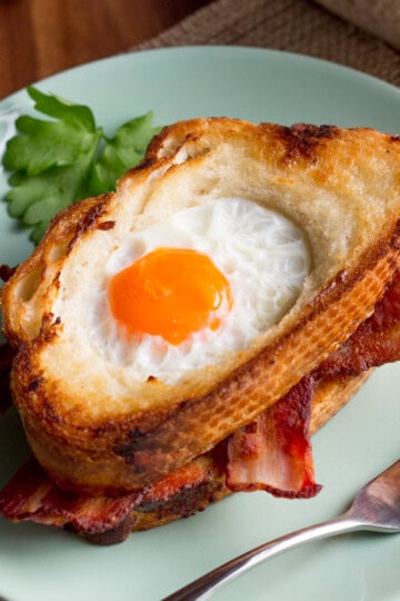 Easy Egg In A Hole Bacon Sandwich on a plate