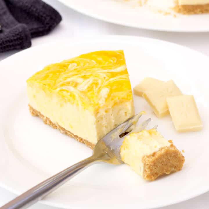 Mango & White Chocolate cheesecake on a plate
