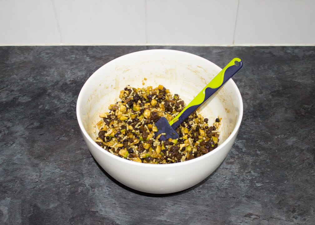 homemade mincemeat ingredients in a large white bowl
