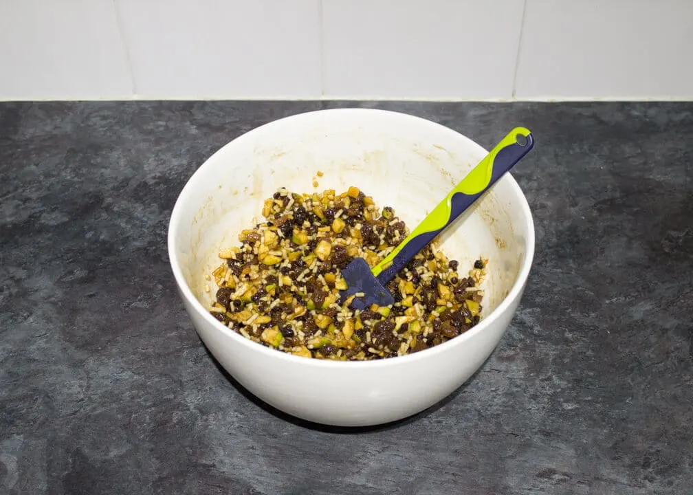 homemade mincemeat ingredients in a large white bowl