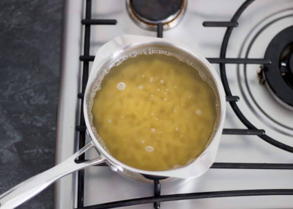 Macaroni Cheese - pasta in boiling water in a pan