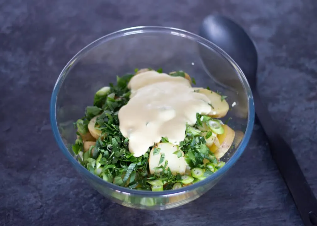 Boiled Potatoes in a Bowl with Spring Onion and Mayonnaise