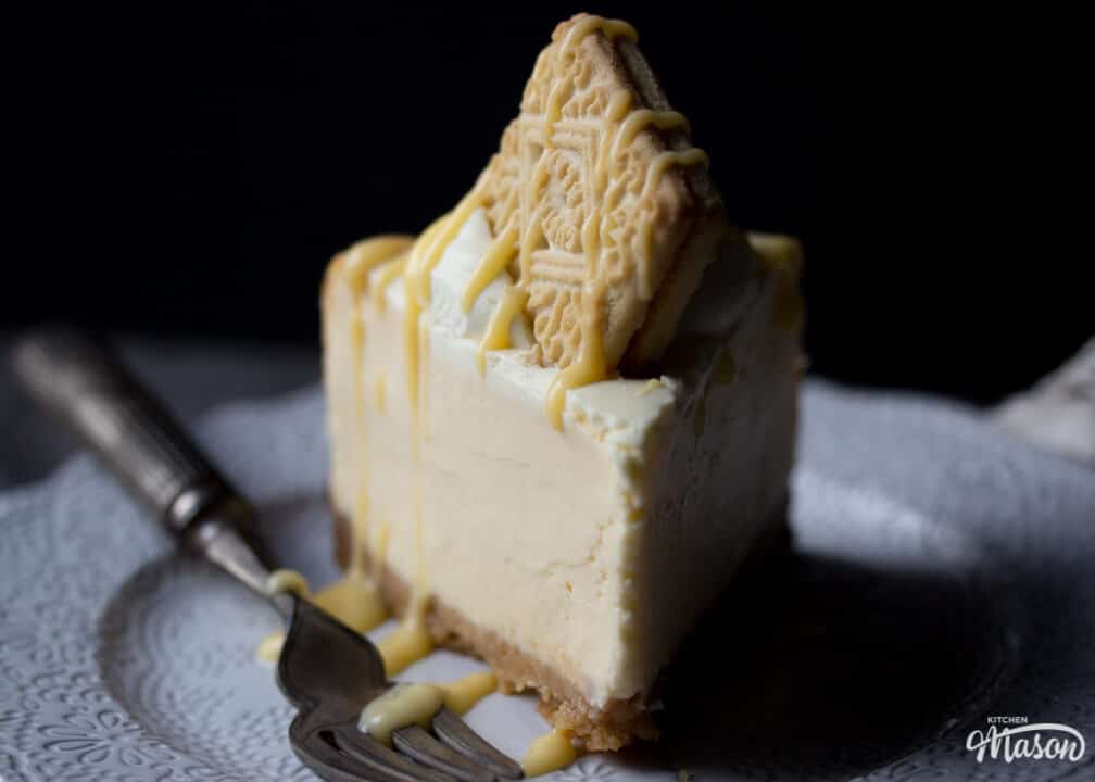 Custard cream baked cheesecake on a plate with a fork