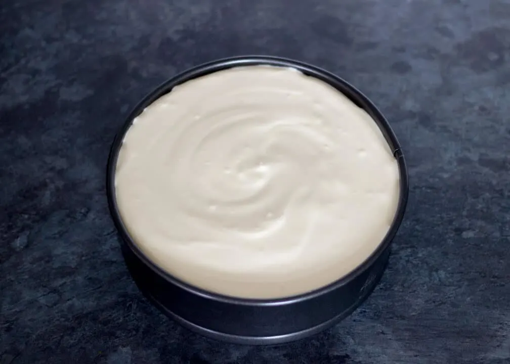 Baked cheesecake filling in a tin
