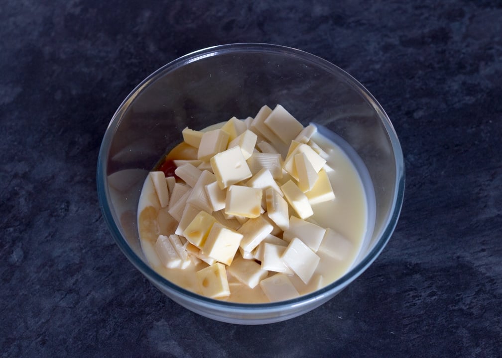 Milk & Cookies Chocolate Fudge Recipe: Chocolate Fudge ingredients in a bowl