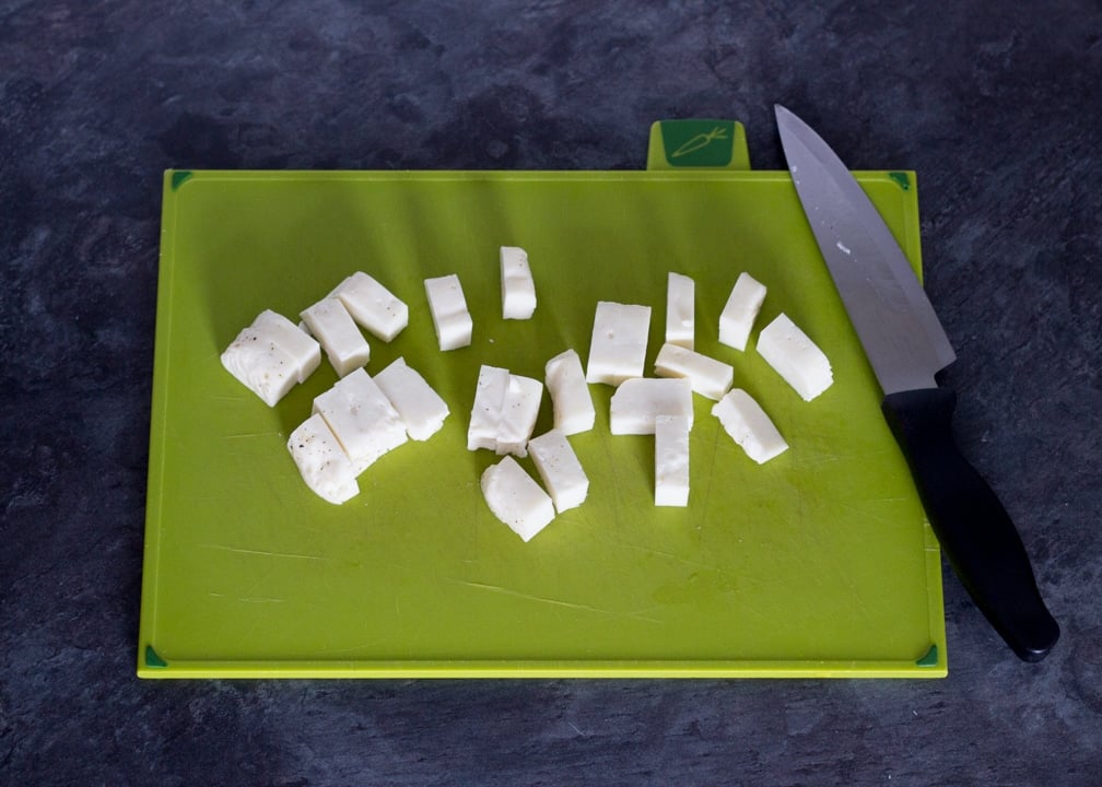 Party Snacks: Chopped halloumi on a chopping board