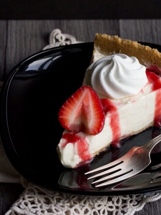 Vanilla Strawberry Cheesecake Recipe: slice on a plate