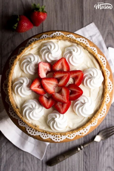 Vanilla Strawberry Cheesecake Recipe: on a cake stand