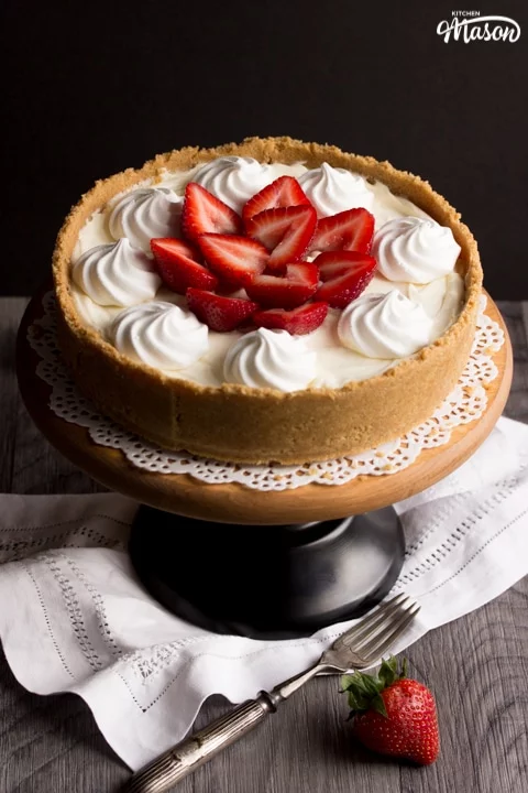 Vanilla Strawberry Cheesecake Recipe: on a cake stand