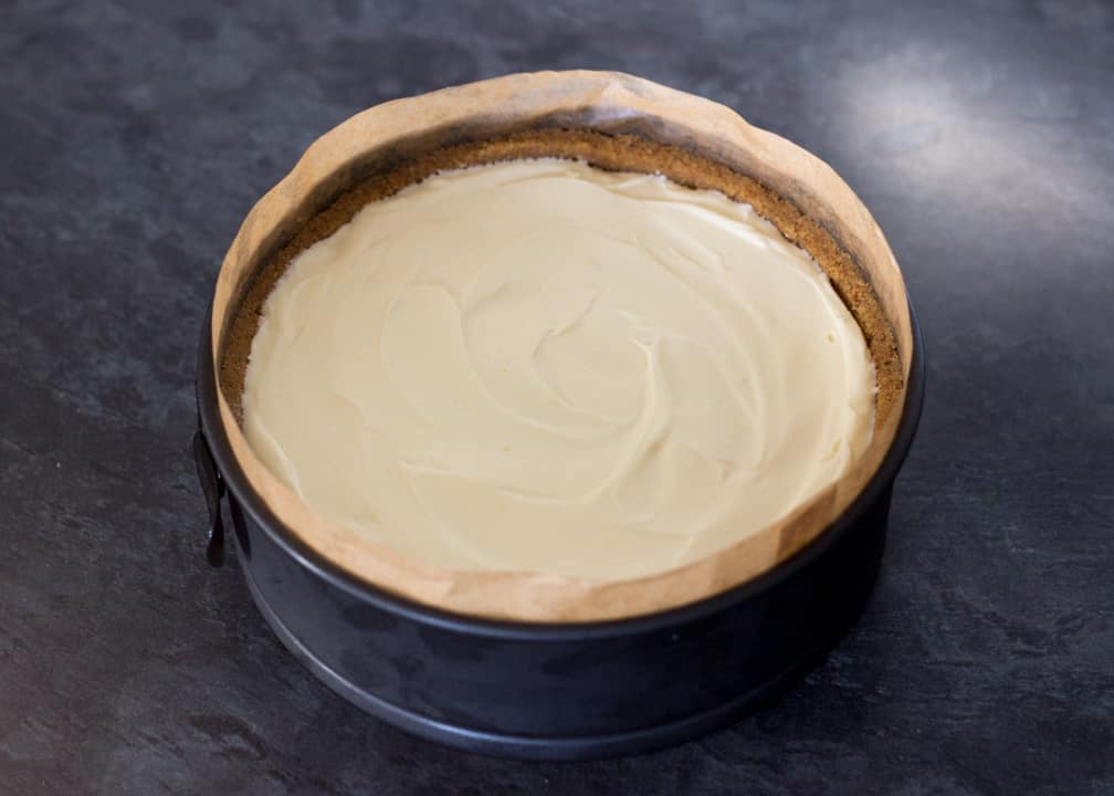 Lemon Cheesecake Recipe: cheesecake filling in a springform pan smoothed out