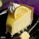 Lemon Cheesecake Recipe: slice of lemon cheesecake on a plate