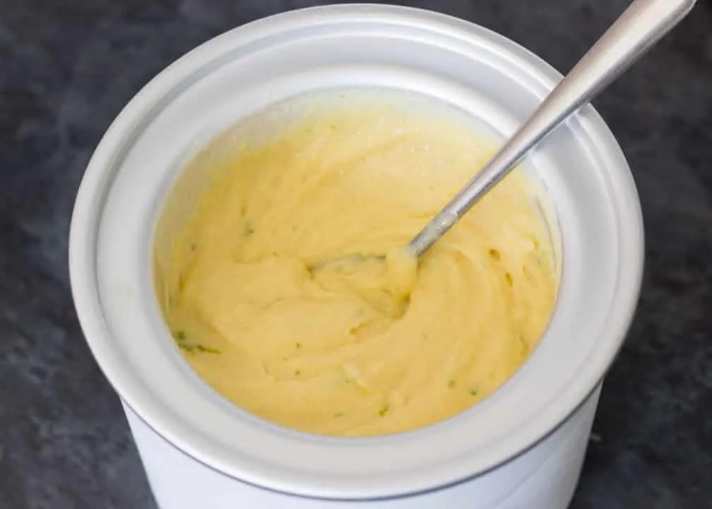 Homemade ice cream in a churner bowl