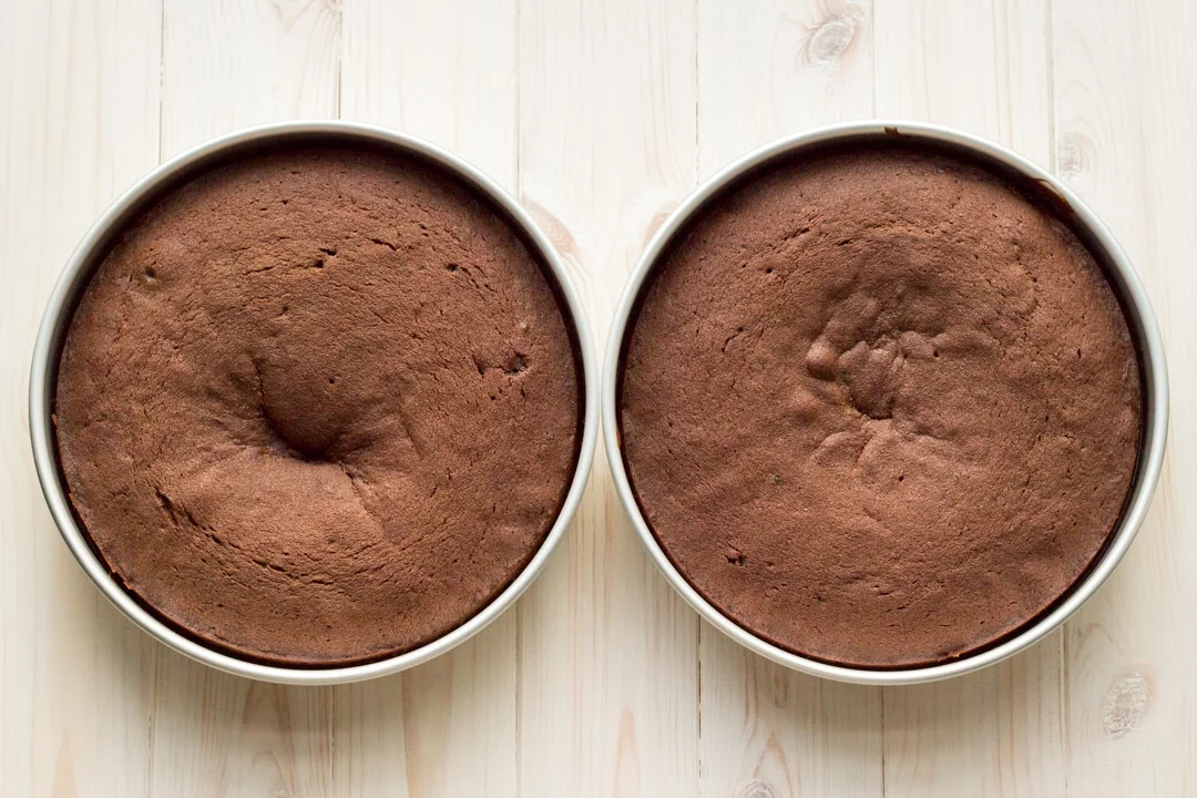 Easy chocolate cake recipe: Two baked Chocolate cakes in their tins