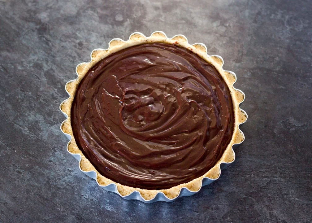 No Bake Caramel Chocolate Tart Recipe: Assembled no bake caramel chocolate tart in a fluted tin