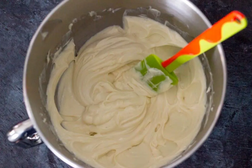 Cream cheese and sugar beaten together in the bowl with a spatula