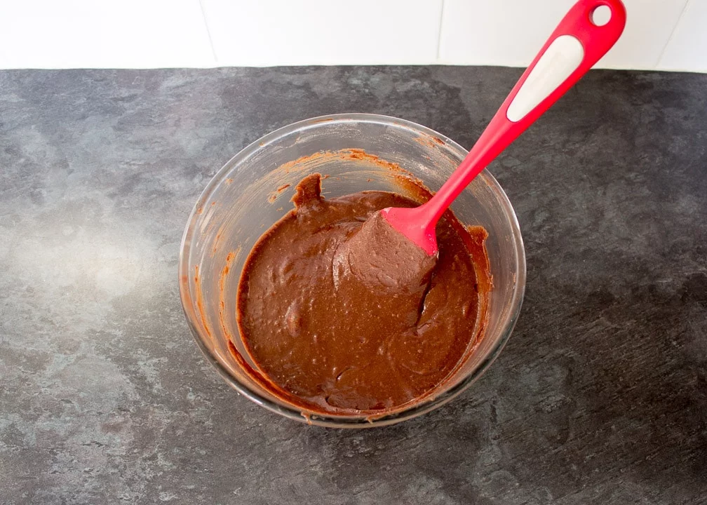 brownie batter in a glass bowl