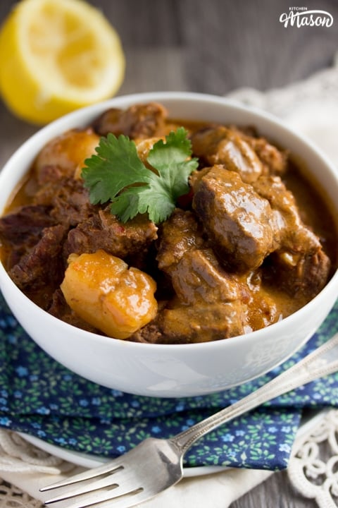 beef massaman curry in a white bowl