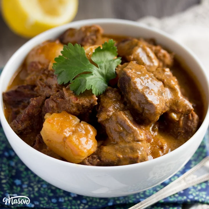 beef massaman curry in a white bowl