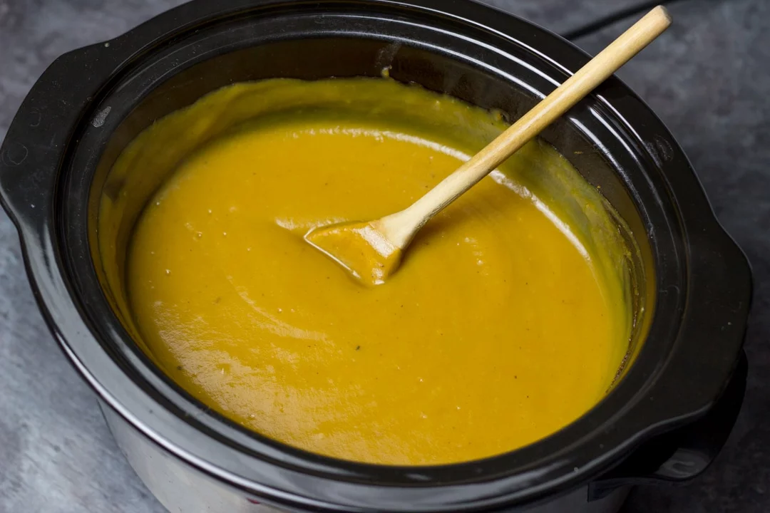 slow cooker pumpkin soup blended in a slow cooker