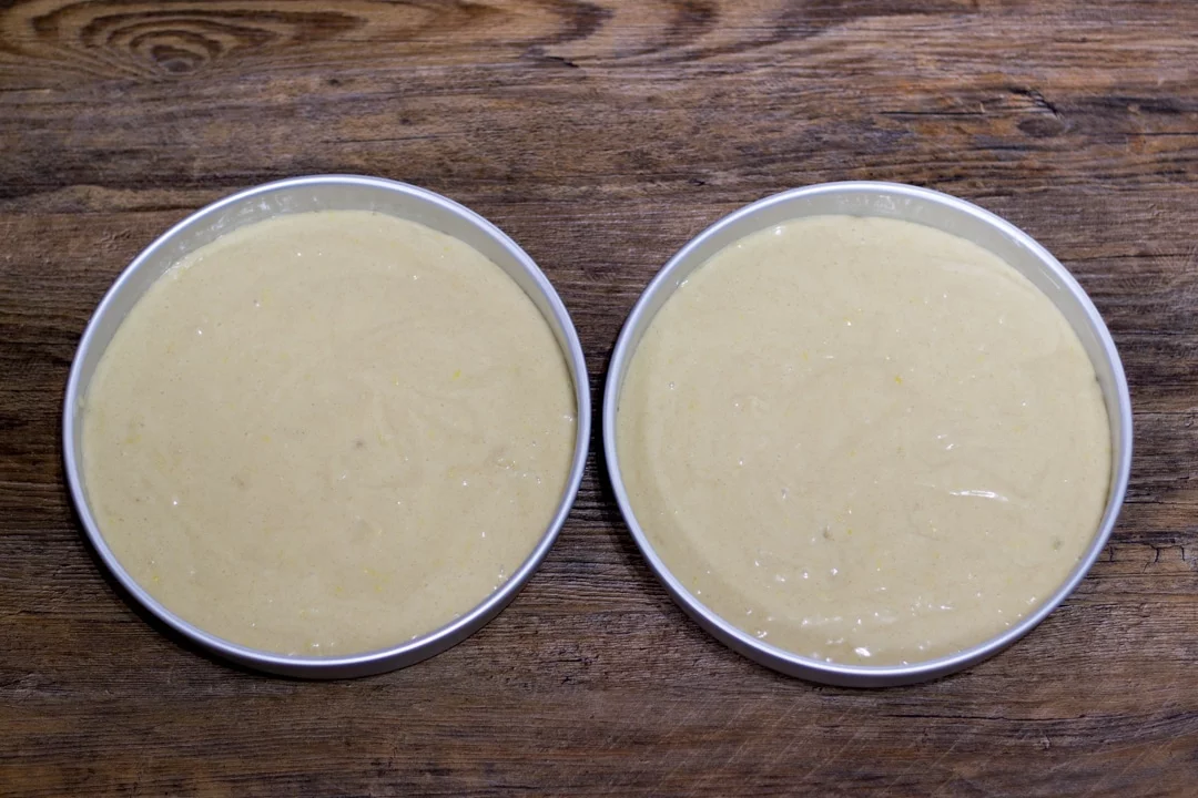 dairy free / vegan lemon cake batter in two round cake tins