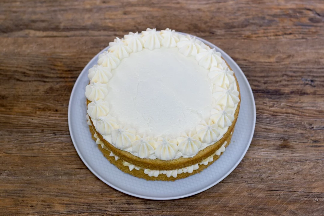 dairy free / vegan lemon cake decorated with frosting