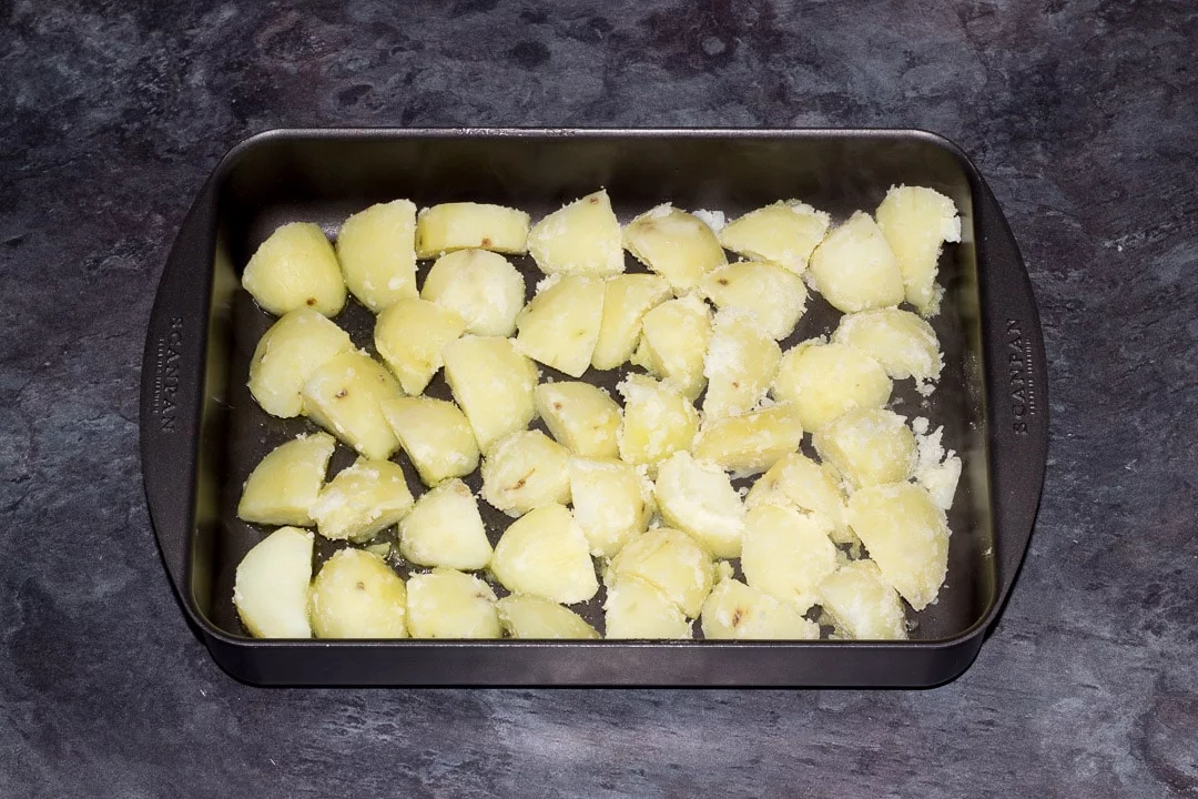 boiled potatoes in a roasting dish