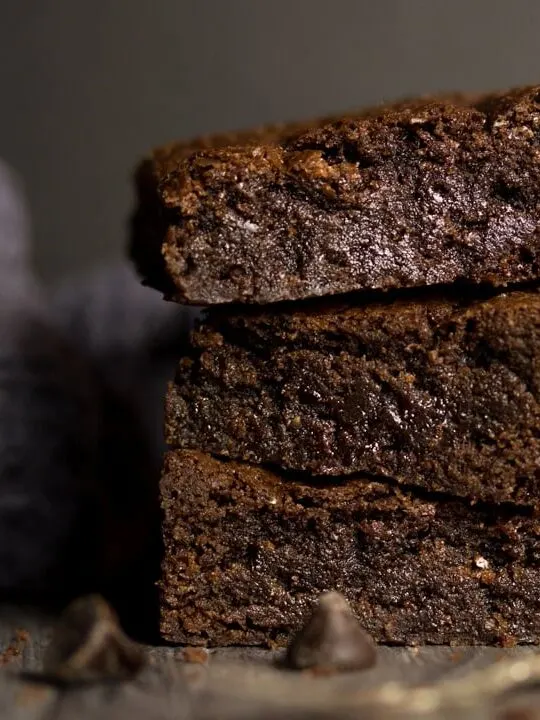 fudgy vegan gluten free brownies in a stack