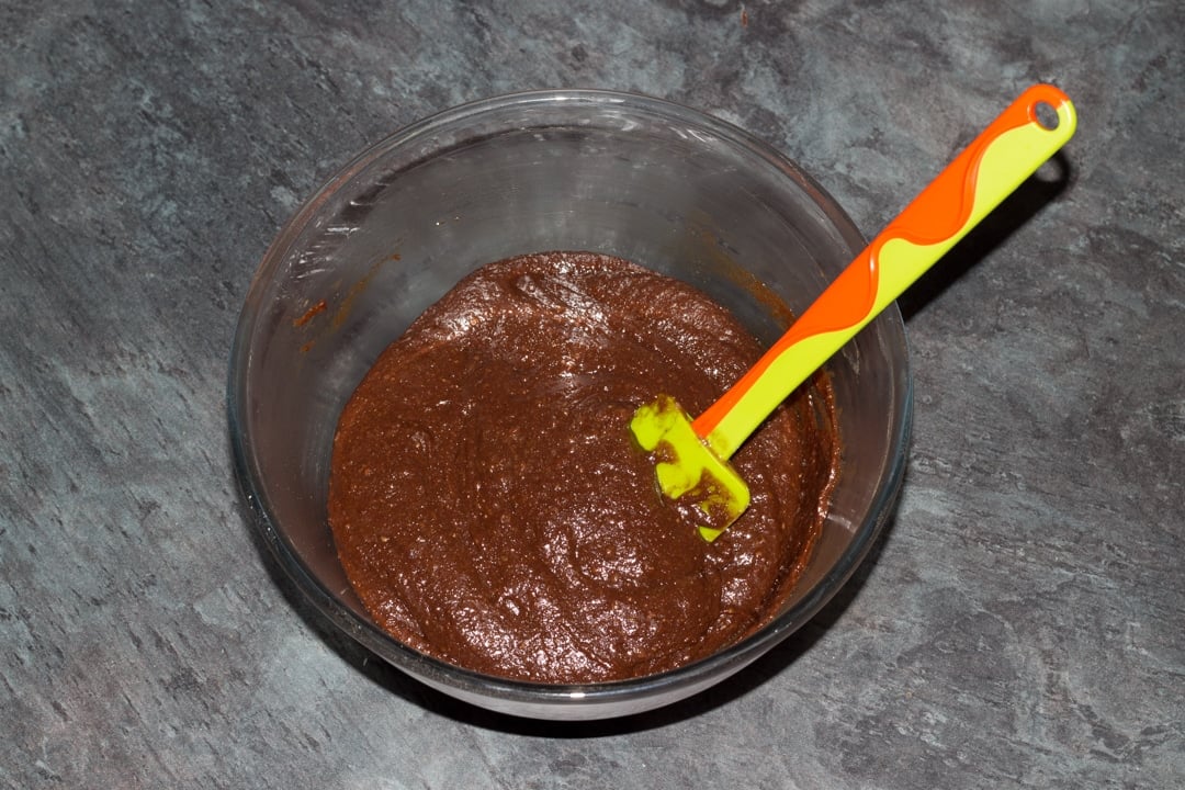 vegan gluten free brownies batter in a glass bowl