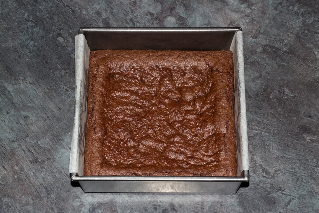 baked vegan gluten free brownies in a baking tin