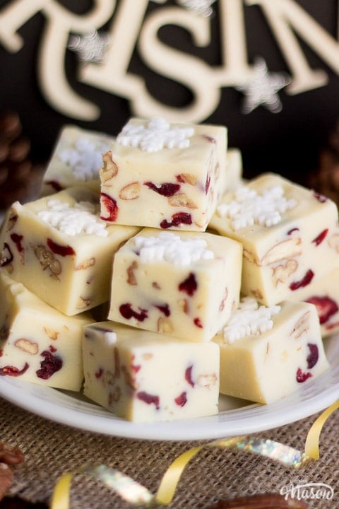 White chocolate pecan cranberry fudge on a plate