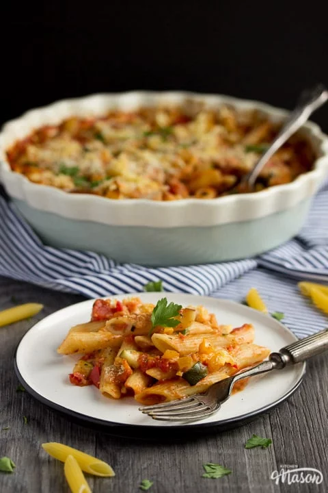 vegetable pasta bake on a plate with a fork