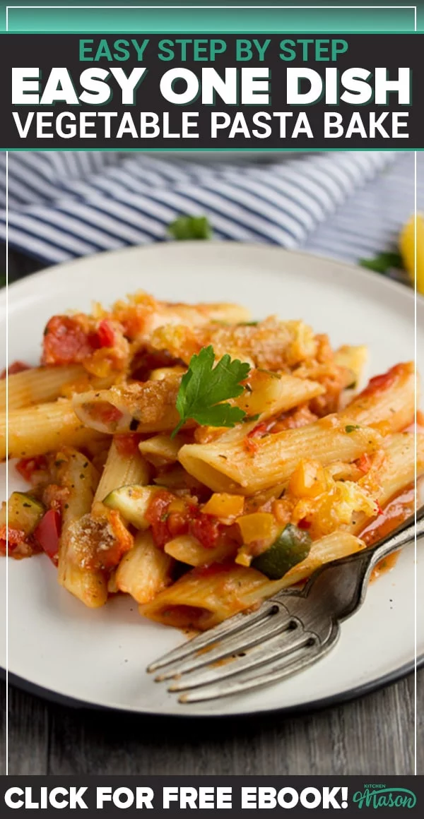 vegetable pasta bake on a plate with a fork