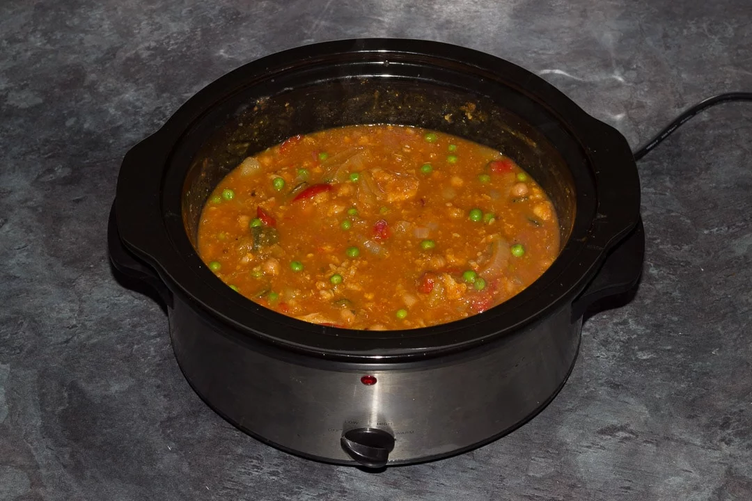 Cooked slow cooker vegetable curry in a slow cooker
