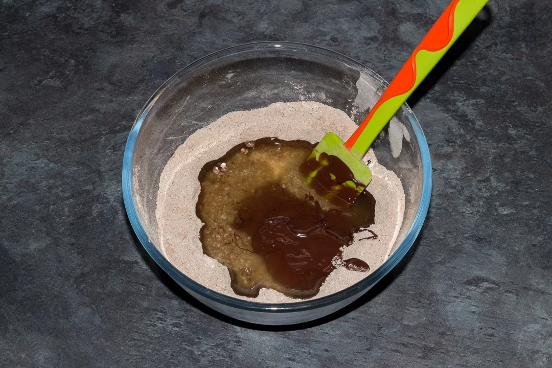 vegan gluten free brownie ingredients in a large glass bowl
