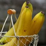 3 bananas in a wire basket