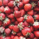 lots of strawberries in a large pile