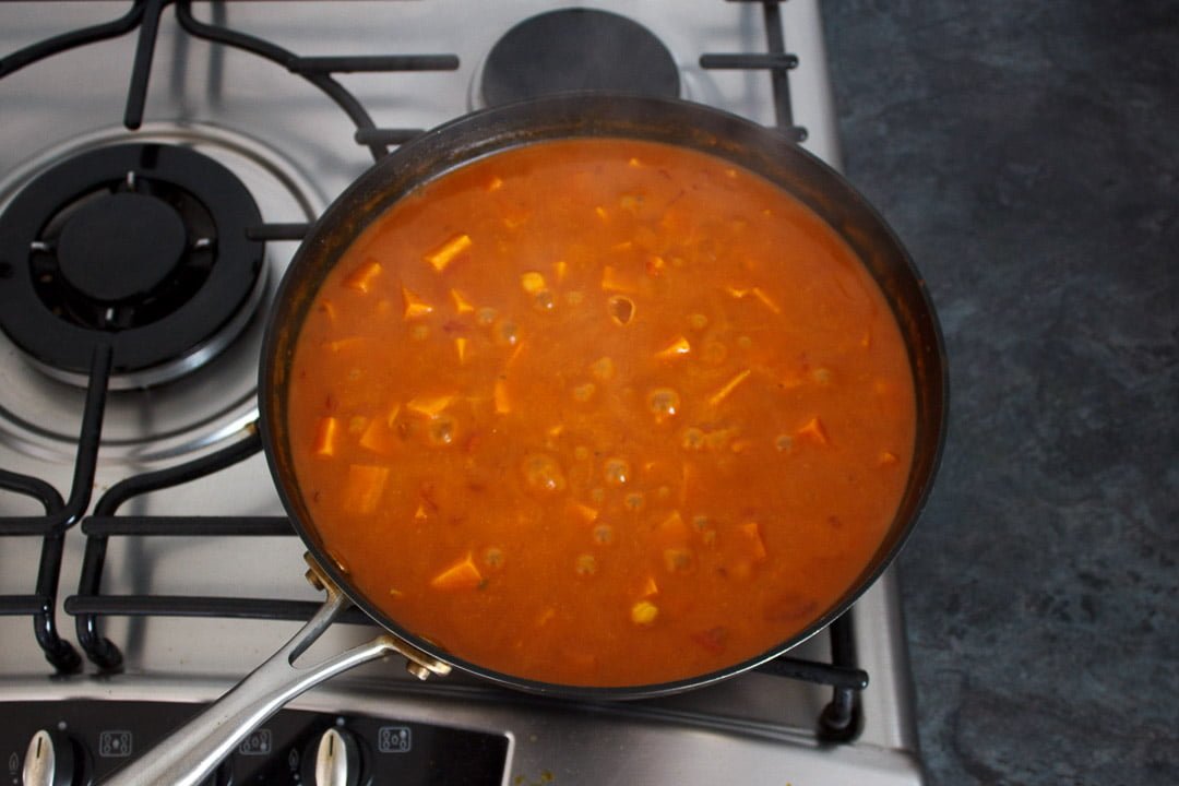 sweet potato chickpea curry in a frying pan