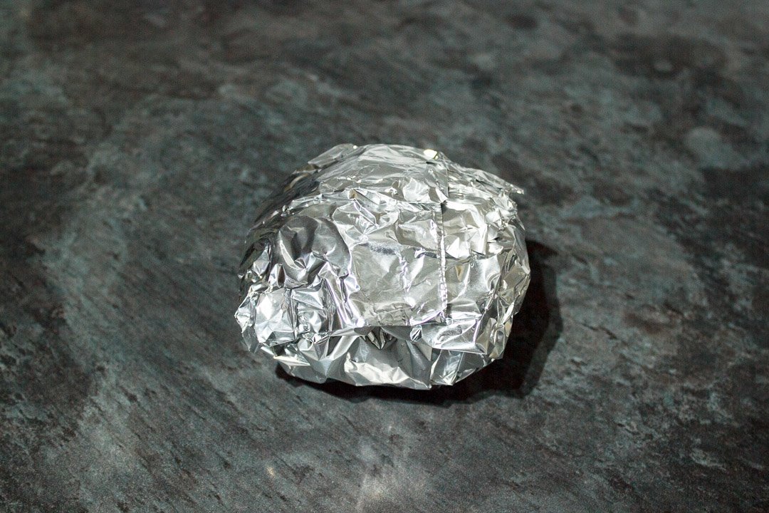 a jacket potato wrapped in tin foil