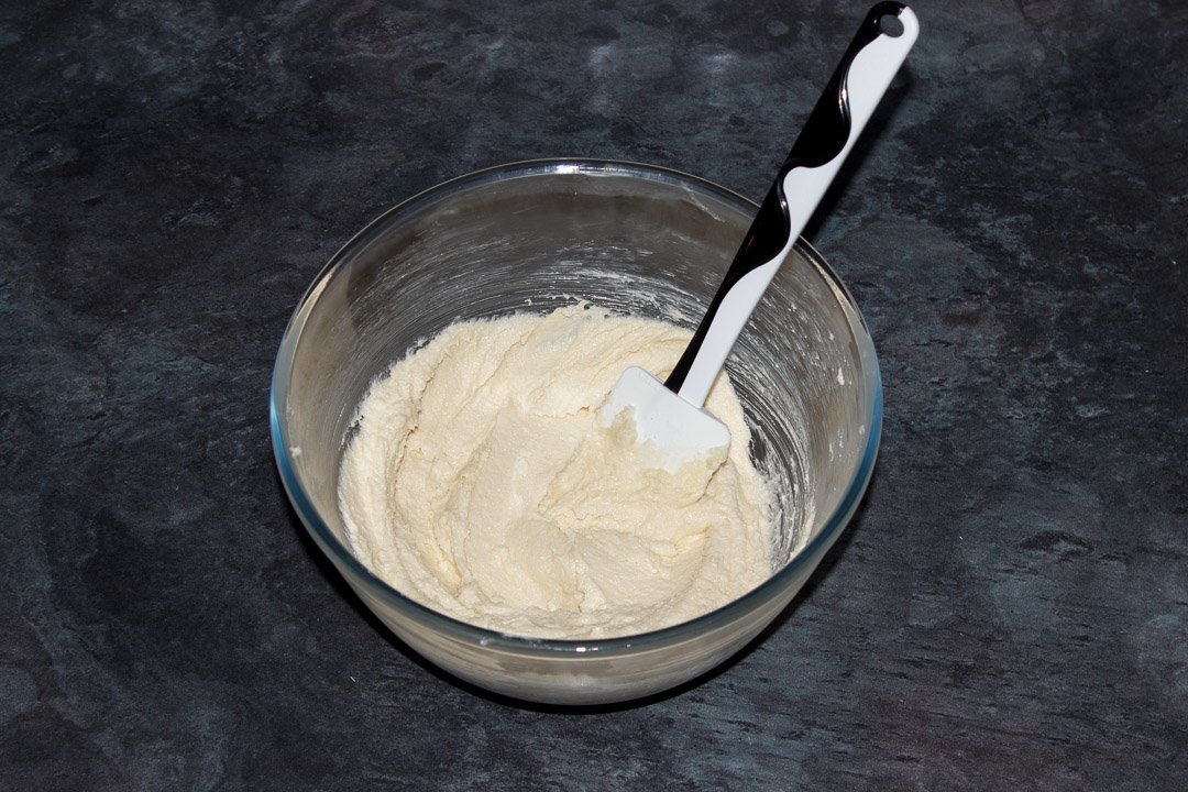 butter and sugar creamed together in a bowl